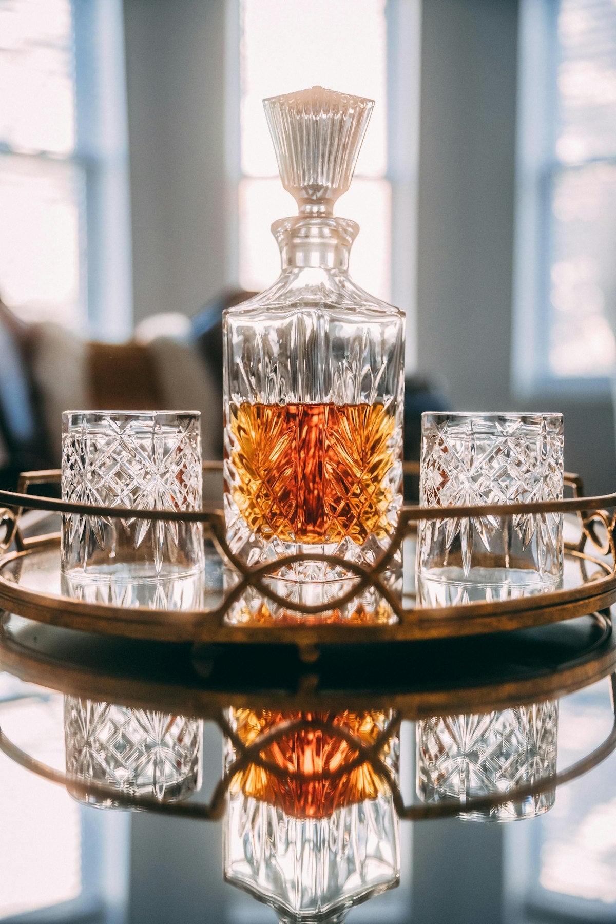 Whiskey decanter on dark surface